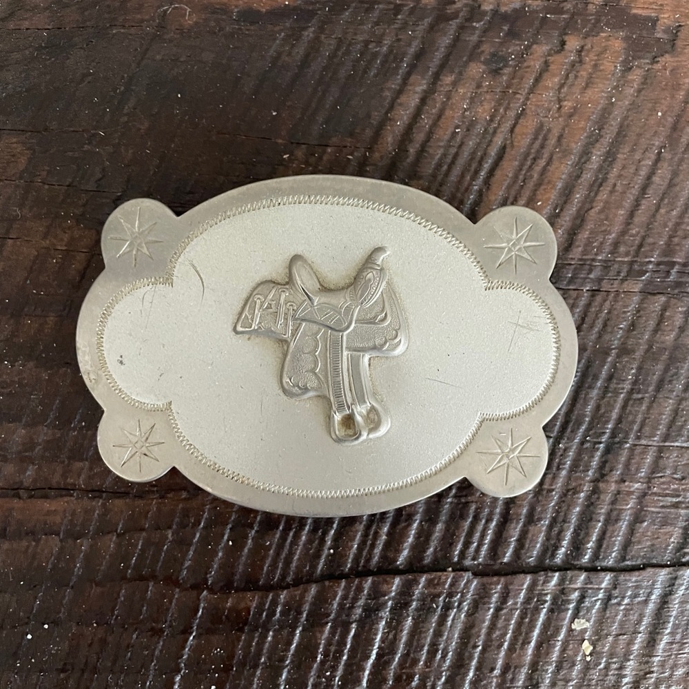 Vintage nickel plated cowboy saddle belt buckle